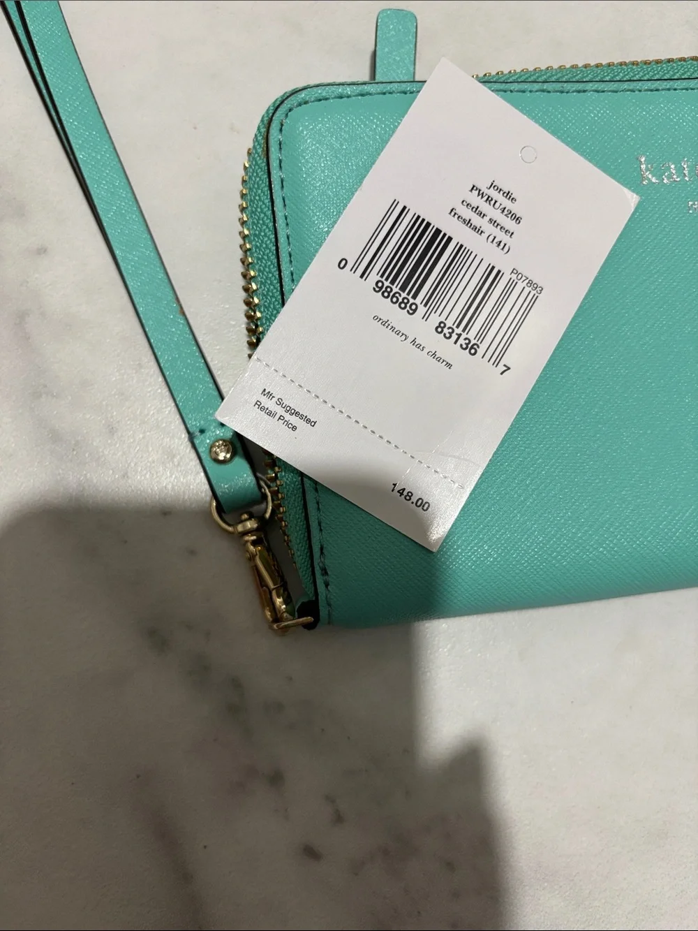 kate spade turquoise zip around wallet with gold hardware